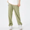 Elastické sportovní kalhoty s vysokým pasem a potiskem písmen „Black Olive Green“